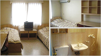 Dormitory interior, bed, toilet